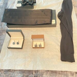 Mens formal wear. Never worn. Black bow tie, cummerbund, socks and cuff links